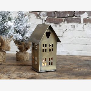 Lyshus med hjerte i gavlen