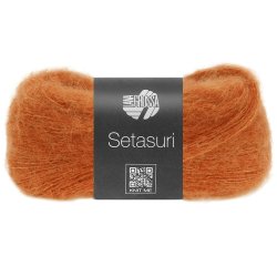 Setasuri let og luksuri�st lacegarn fra Lana Grossa. 25g